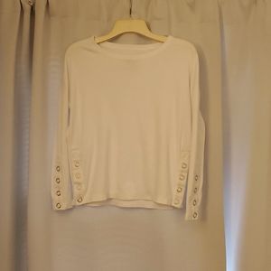 Chaser ribbed white top with grommet button detail.